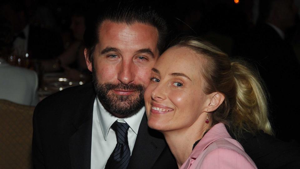 Billy Baldwin and Chynna Phillips hold their faces close for a photo