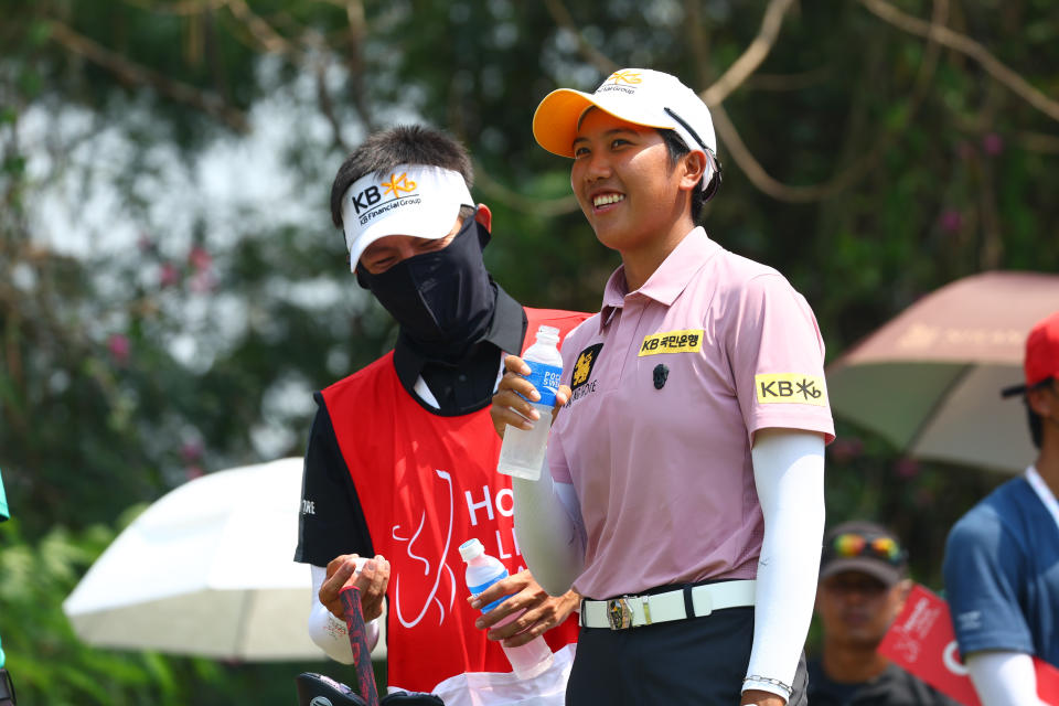 Natthakritta Vongtaveelap of Thailand smiles before tee off at 18th hole during the second round of the Honda LPGA Thailand at Siam Country Club on Feb. 24, 2023. (Photo by Thananuwat Srirasant/Getty Images)
