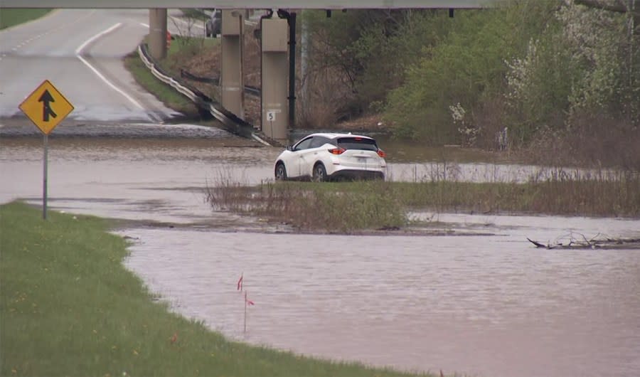 A car stops before entering a flood zone at U.S. Route 23 and Interstate 270 in south Columbus. (NBC4)