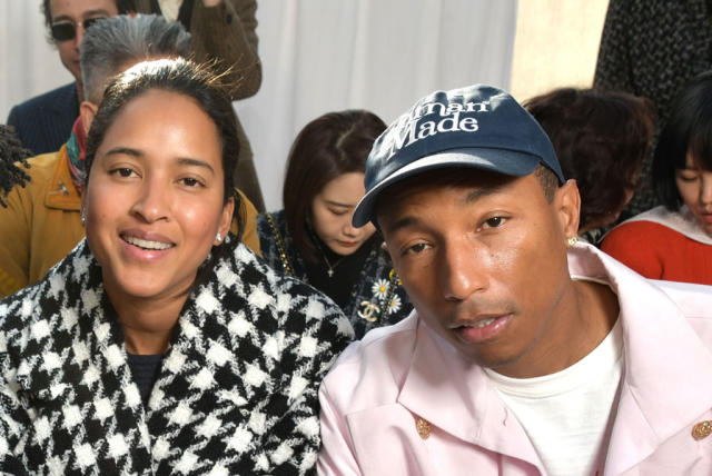 Pharrell Williams, right, and wife Helen Williams attend the