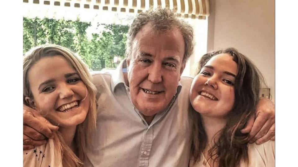 Jeremy Clarkson with his arms around daughters Emily and Katya