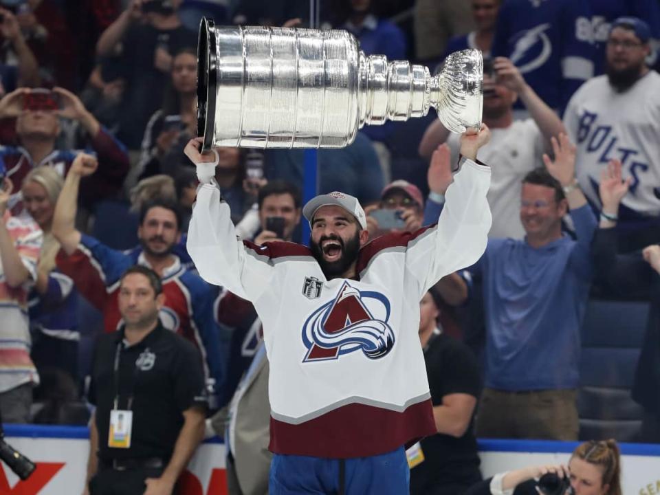 Nazem Kadri holds the Stanley Cup after the Colorado Avalanche victory over Tampa Bay on Sunday. (Mike Carlson/Getty Images - image credit)