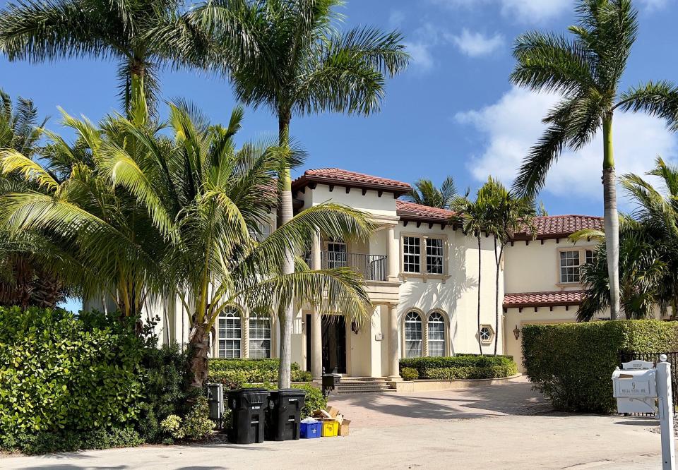 View of lakefront home purchased recently by Guy Fieri, Thursday in Lake Worth Beach.