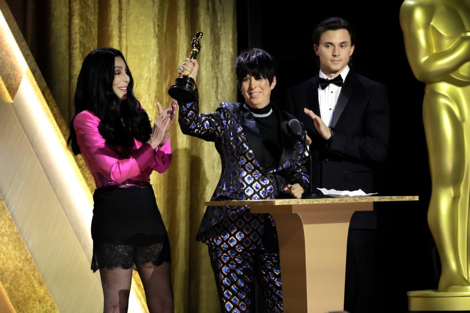 Cher (left) presents Diane Warren with her honorary Oscar during the Governors Awards.