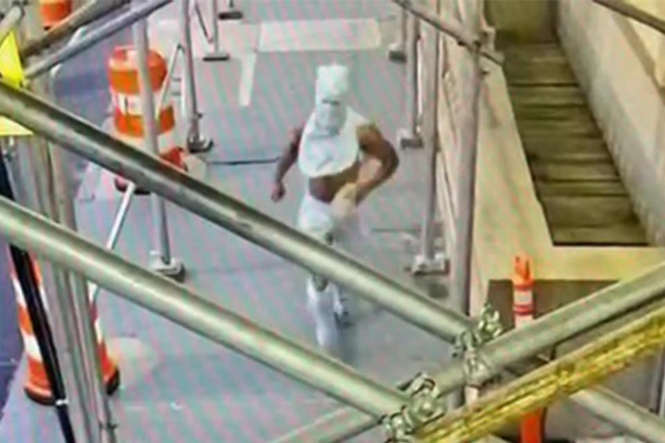 The suspect seen running away after the attack. Obtained by NY Post