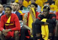 May 4, 2016; Cleveland, OH, USA; Atlanta Hawks guard Jeff Teague (0), forward Mike Scott (32) and guard Dennis Schroder (17) watch from the bench during the second half against the Cleveland Cavaliers in game two of the second round of the NBA Playoffs at Quicken Loans Arena. Mandatory Credit: Ken Blaze-USA TODAY Sports