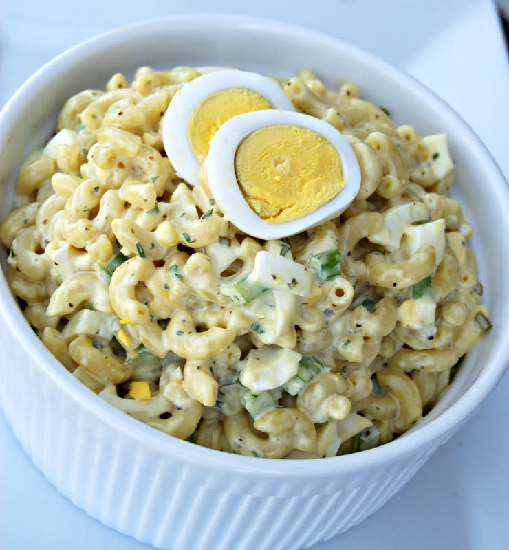 <p>Krista Marshall</p><p>This recipe has a secret ingredient that will keep people guessing.</p><p><strong>Get the recipe:</strong> <strong><a href="https://parade.com/842620/kristamarshall/country-macaroni-salad/" rel="nofollow noopener" target="_blank" data-ylk="slk:Country Macaroni Salad;elm:context_link;itc:0;sec:content-canvas" class="link ">Country Macaroni Salad </a></strong></p>