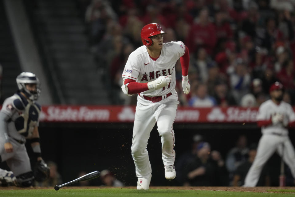 Los Angeles Angels designated hitter Shohei Ohtani (17) doubles during the fifth inning of a baseball game against the Houston Astros in Anaheim, Calif., Monday, May 8, 2023. Taylor Ward scored. (AP Photo/Ashley Landis)