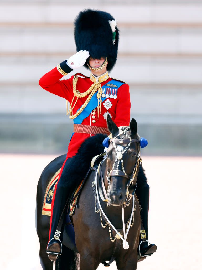 the prince of wales carries out the colonel's review