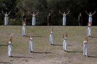 Olympics - Dress Rehearsal - Lighting Ceremony of the Olympic Flame Pyeongchang 2018 - Ancient Olympia, Olympia, Greece - October 23, 2017 Actors perform during the dress rehearsal for the Olympic flame lighting ceremony for the Pyeongchang 2018 Winter Olympic Games at the site of ancient Olympia in Greece REUTERS/Costas Baltas