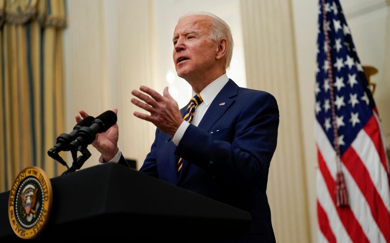 Biden said it was in the "national interest" to allow all qualified Americans - Evan Vucci /AP