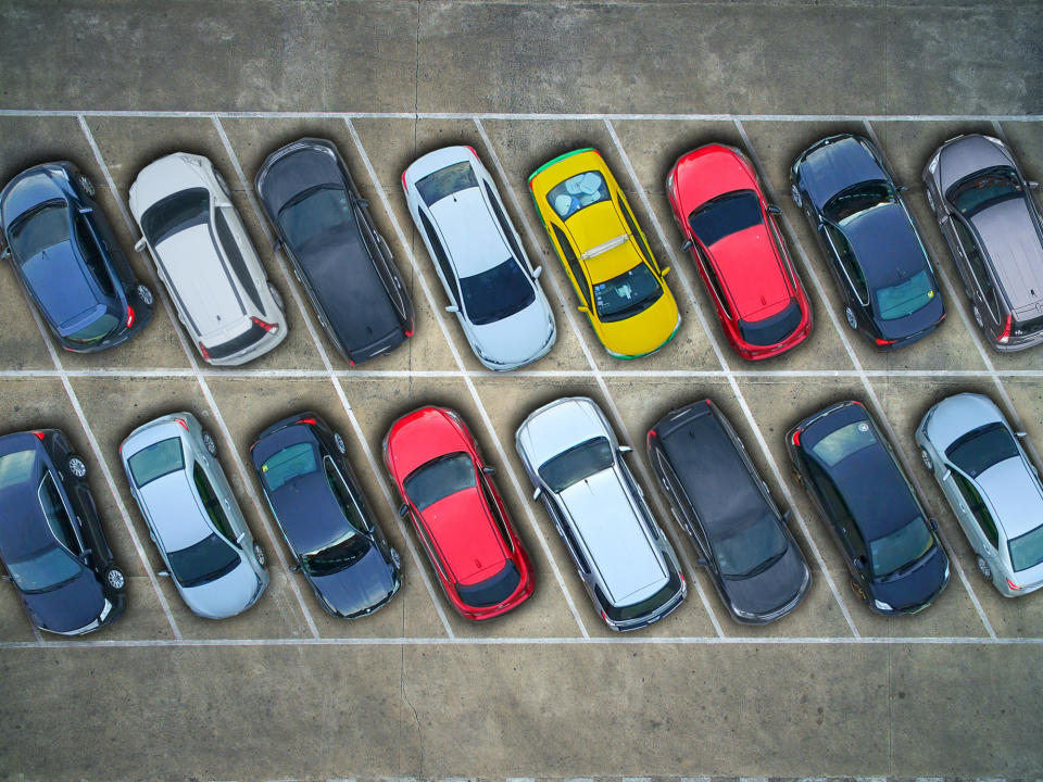 Two rows of parked cars