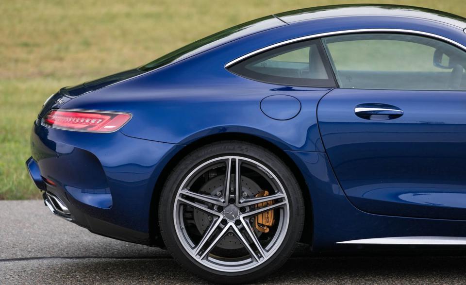 <p>While you don't feel the GT C's 3741 pounds in hard driving, you are aware of the sheer size of the car. The GT C is less than two inches longer than a 911, but it's fully six inches wider than a Carrera GTS, let alone a base 911. On narrow European roads, that broad beam was noticeable.</p>