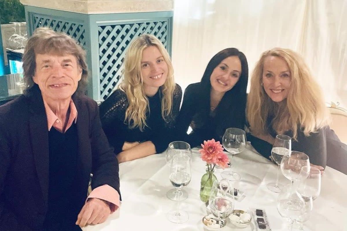 Happy exes: Mick Jagger and Jerry Hall (right) joined by their daughter Georgia May (centre left) and his girlfriend Melanie Hamrick (centre right) (Instagram )