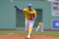 Boston Red Sox pitcher Nathan Eovaldi throws against a Baltimore Orioles player in the first inning of a baseball game, Thursday, Sept. 29, 2022, in Boston. (AP Photo/Steven Senne)