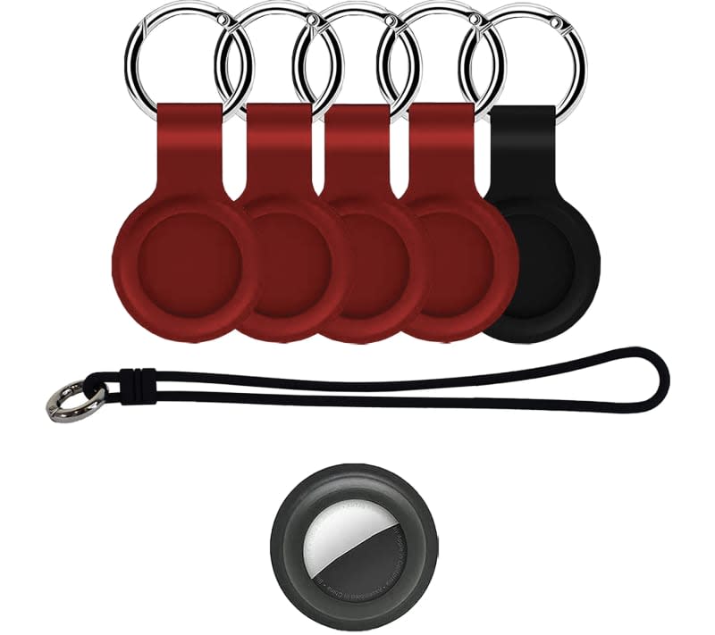 five red Apple AirTag Keychain Cases with black Luggage Tag