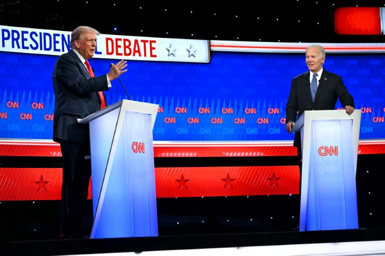 US President Joe Biden and former US President and Republican presidential candidate Donald Trump participate in the first presidential debate of the 2024 elections at CNN's studios in Atlanta, Georgia (ANDREW CABALLERO-REYNOLDS)