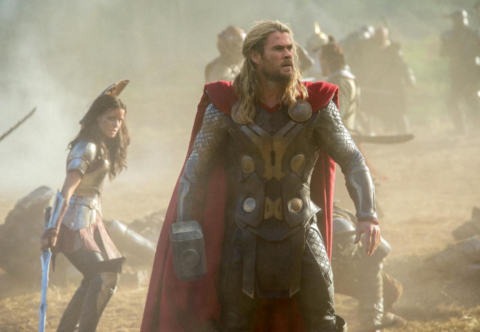 This publicity photo released by Walt Disney Studios and Marvel shows Jaimie Alexander, left, and Chris Hemsworth in a scene from "Thor: The Dark World." (AP Photo/Walt Disney Studios/Marvel, Jay Maidment)