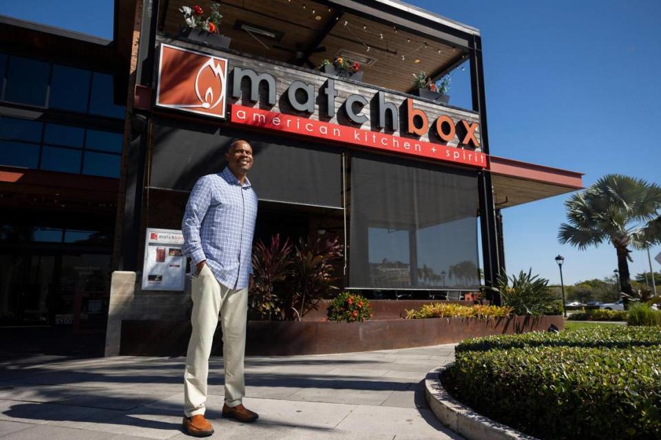 Warren Thompson, founder of Thompson Hospitality, poses in front of his company’s Matchbox restaurant on Wednesday, Jan. 31, 2024, at Sawgrass Mills in Sunrise. Thompson started the company in 1992 after working at Marriott. Alie Skowronski/askowronski@miamiherald.com