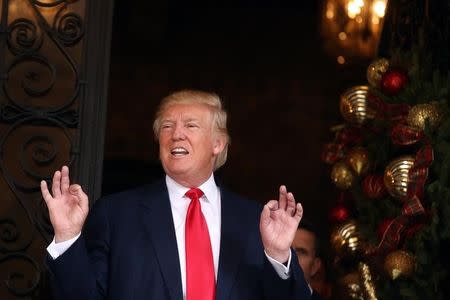 U.S. President-elect Donald Trump talks to members of the media at Mar-a-Lago estate in Palm Beach, Florida, U.S., December 21, 2016. REUTERS/Carlos Barria