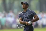 Tiger Woods hits from the fairway on the 13th hole during the first round of the PGA Championship golf tournament, Thursday, May 19, 2022, in Tulsa, Okla. (AP Photo/Eric Gay)