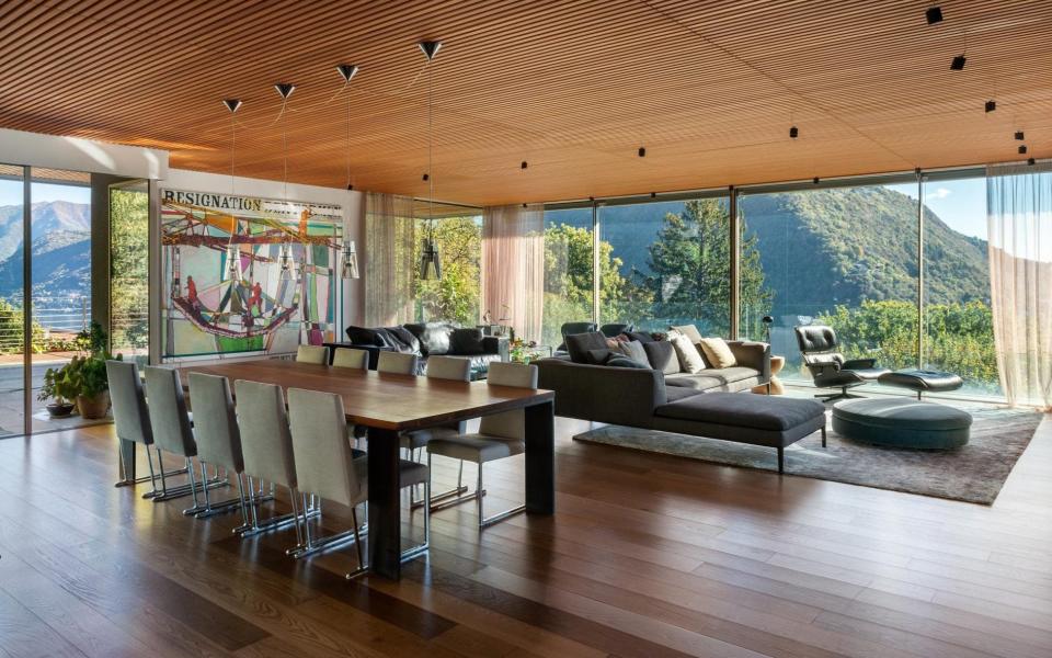 A dining room with panoramic lake views 