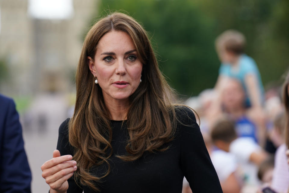 The royal mother-of-three wore a pair of pear-drop earrings for the poignant outing. (Getty Images)