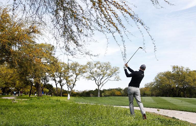 Martin Kaymer of Germany takes his second shot on the ninth hole during round one of the Valero Texas Open, at TPC San Antonio AT&T Oaks Course in San Antonio, on March 26, 2015