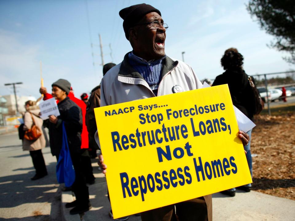 Peter Fagan, 74, demonstrates outside the acting Nassau County Sheriff Michael Sposato's office during the ACORN Home Defenders rally in East Meadow, New York February 26, 2009. Families facing eviction and members of ACORN's Home Defenders rallied for all evictions on foreclosed homes to be suspended until the implementation of President Barack Obama?s homeowners? recovery package.