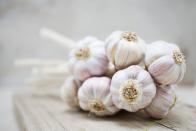 <p>Onions, garlic, chives, leeks and shallots do more than just impart a flavorful boost to your dishes. These flowering plants contain a compound known as organosulfur, which aids the body’s detoxification process. One <u><a href="https://www.ncbi.nlm.nih.gov/pubmed/17093154" rel="nofollow noopener" target="_blank" data-ylk="slk:study;elm:context_link;itc:0;sec:content-canvas" class="link ">study</a></u> published in the <em>American Journal of Clinical Nutrition</em>, suggests that a diet with onions and garlic can help decrease your risk for disease. Add minced garlic and onions to your stir-fries, salads, and soups to reap their disease-fighting benefits. </p>