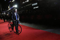 FILE - In this Tuesday, Oct. 14, 2014 file photo London mayor Boris Johnson poses for photographers upon arrival at the premiere of the film Testament of Youth, in London. (Photo by Joel Ryan/Invision/AP, File)