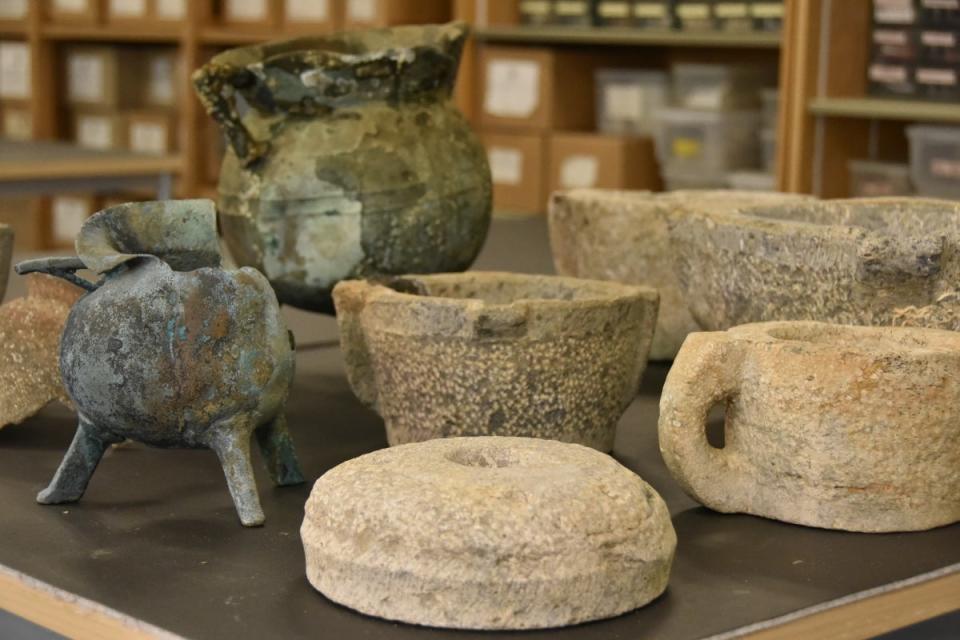 Stone mortars and cookware found on the Mortar wreck in Dorset (Bournemouth University/PA)