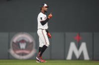 Minnesota Twins' Byron Buxton points after hitting a single during the sixth inning of the team's baseball game against the Chicago White Sox, Wednesday, April 24, 2024, in Minneapolis. (AP Photo/Abbie Parr)