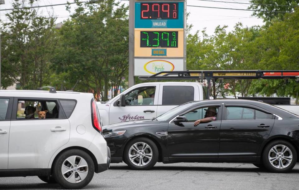 Customers line up for fuel at the at the Valero on Western Blvd. on Tuesday, May 11, 2021 in Tarboro, N.C. Several surrounding stations were without fuel on Tuesday morning, forcing customers to wait in line for about 15 minutes to fill their tanks due to the closure of the Colonial Pipeline by a cyberattack.