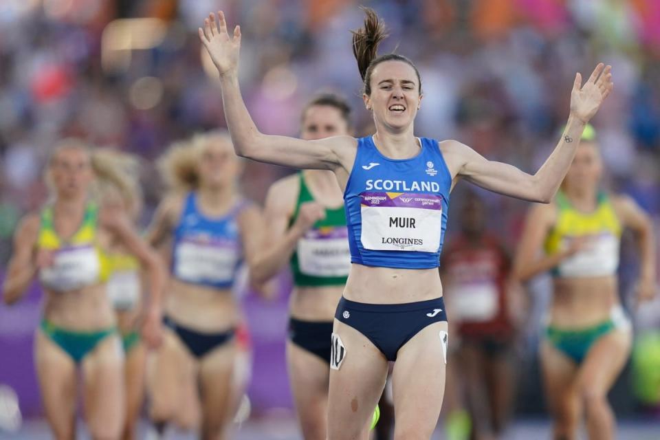 Scotland’s Laura Muir celebrates after winning the women’s 1500m (Jacob King/PA) (PA Wire)