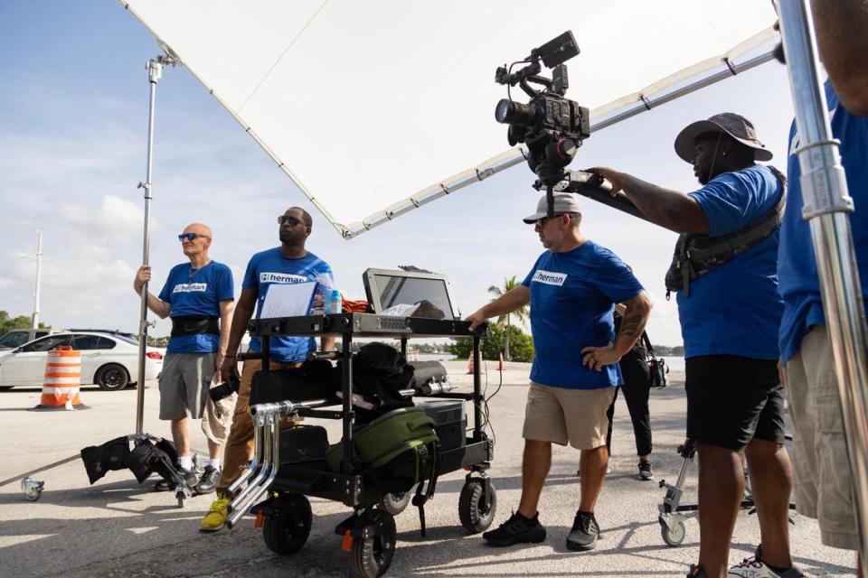 The crew films a scene outside NOMA Beach at Redfish. When putting together his crew, Herman looked for “a group of people that have fun when they’re working together, they’re friendly, and they’re helpful,” he said. Lauren Witte/lwitte@miamiherald.com