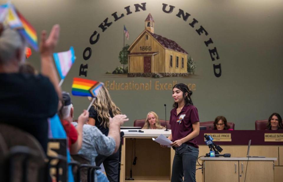 Whitney High School senior class officer Nayeli Glaude is applauded after speaking against a proposed Rocklin Unified School District Board policy Wednesday, Sept. 6, 2023, during a Board meeting. The policy, which violates state law, would require staff to notify families within days of a student’s choosing to be identified as any name, nickname, or gender that does not match enrollment records or is not a “common” nickname recognized by the school.