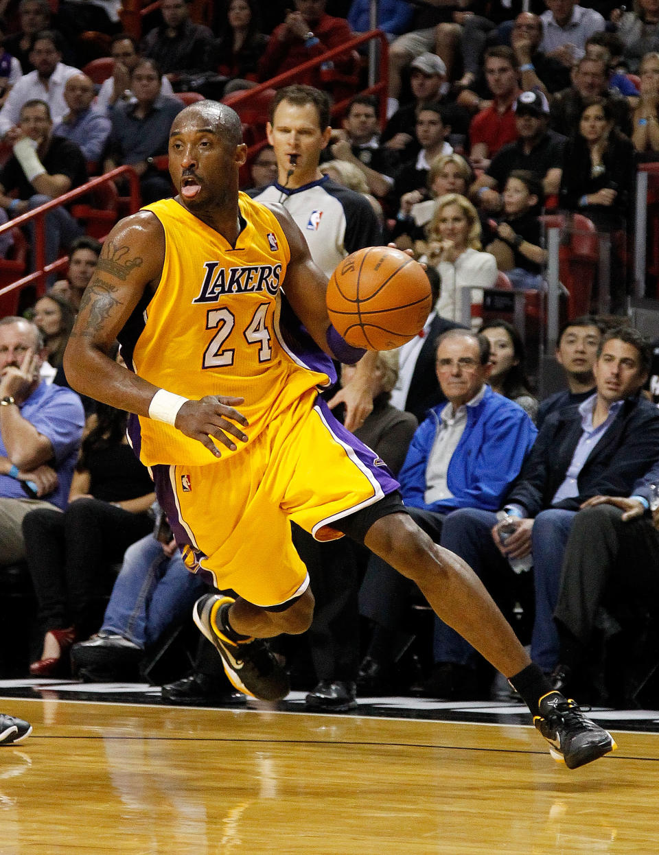 MIAMI, FL - JANUARY 19: Kobe Bryant #24 of the Los Angeles Lakers drives during a game against the Miami Heat at American Airlines Arena on January 19, 2012 in Miami, Florida. NOTE TO USER: User expressly acknowledges and agrees that, by downloading and/or using this Photograph, User is consenting to the terms and conditions of the Getty Images License Agreement. (Photo by Mike Ehrmann/Getty Images)