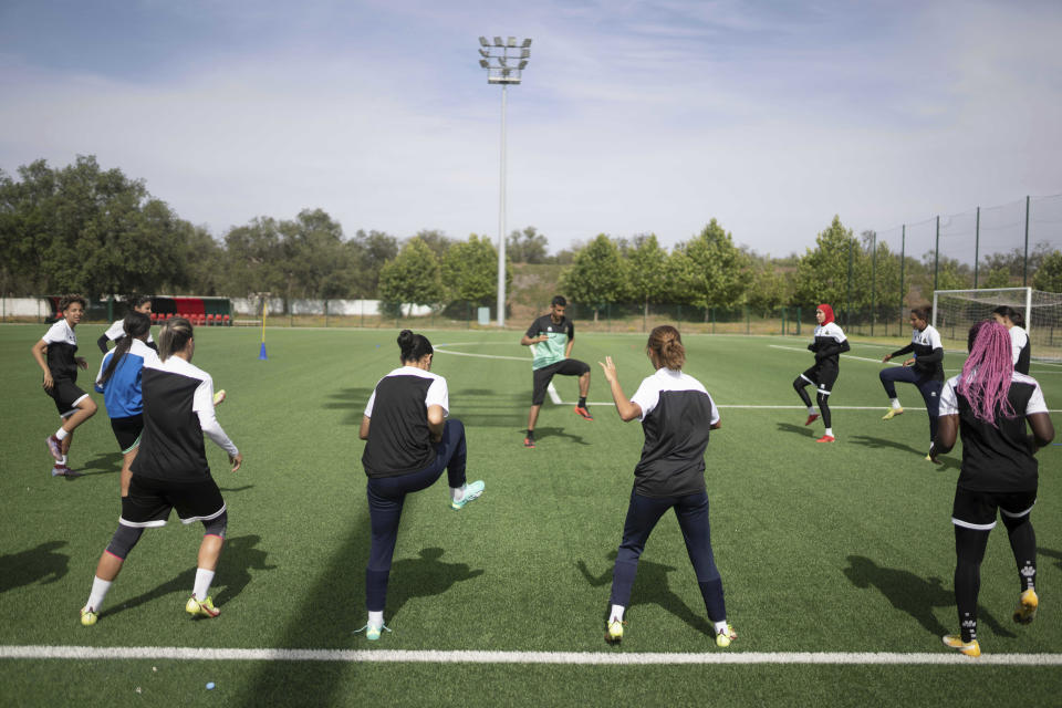 Women players of ASFAR soccer team take part in a training session ahead of a league match the next day in Rabat, Morocco, Tuesday, May 16, 2023. (AP Photo/Mosa'ab Elshamy)