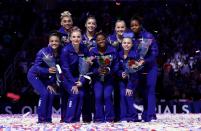<p>While gymnasts can wear colorful makeup, bright<a href="https://fashionista.com/2012/05/from-scrunchies-to-colored-eyeshadow-olympic-hopeful-alicia-sacramone-dishes-on-the-mysterious-world-of-gymnastics-beauty#2" rel="nofollow noopener" target="_blank" data-ylk="slk:nail polish;elm:context_link;itc:0;sec:content-canvas" class="link "> nail polish</a> is a no-go. It's either neutral or none at all for these athletes. </p>