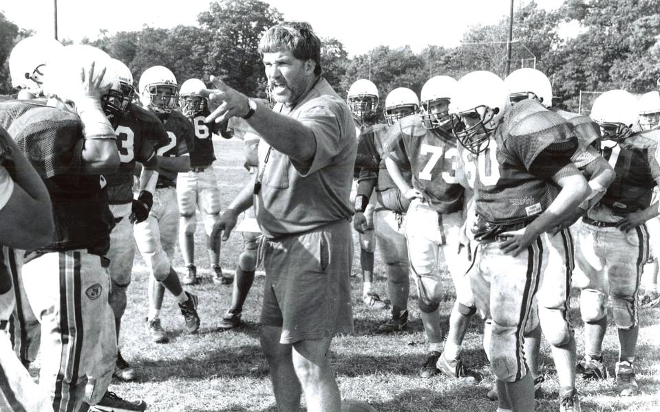 Abington coach Jim Kelliher gives instructions to his players in September of 1995. (The Enterprise)