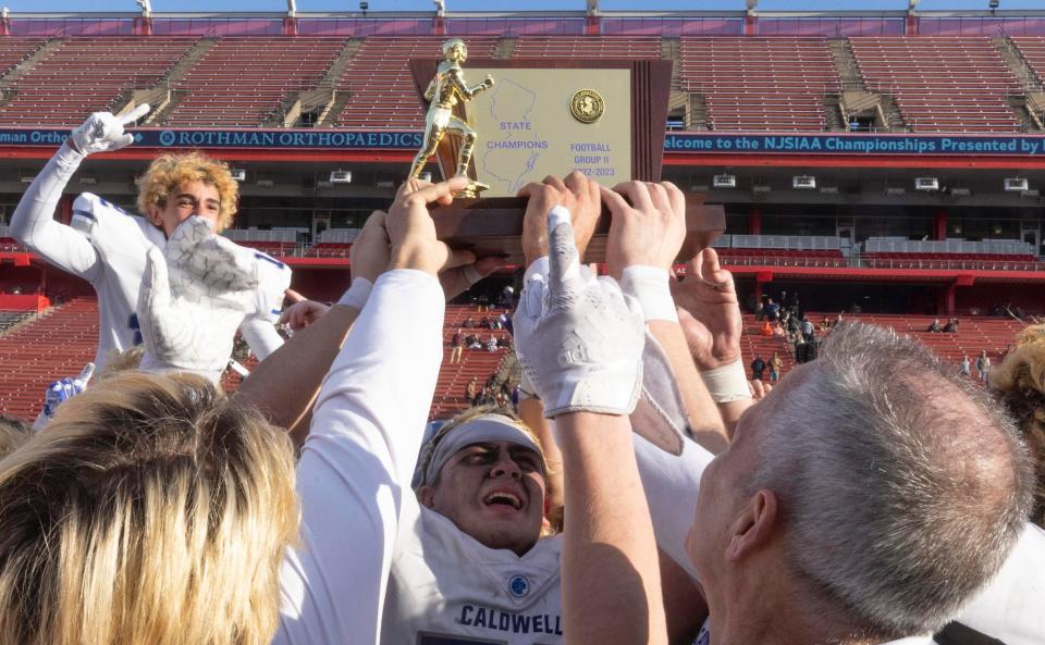 Caldwell celebrate their victory. Rumson-Fair Haven football loses to Caldwell 18-14 in state title game