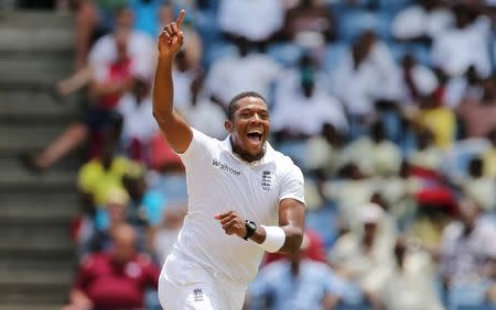 Cricket - West Indies v England - Second Test - National Cricket Ground, Grenada - 21/4/15 England's Chris Jordan celebrates the wicket of West Indies' Devon Smith Action Images via Reuters / Jason O'Brien