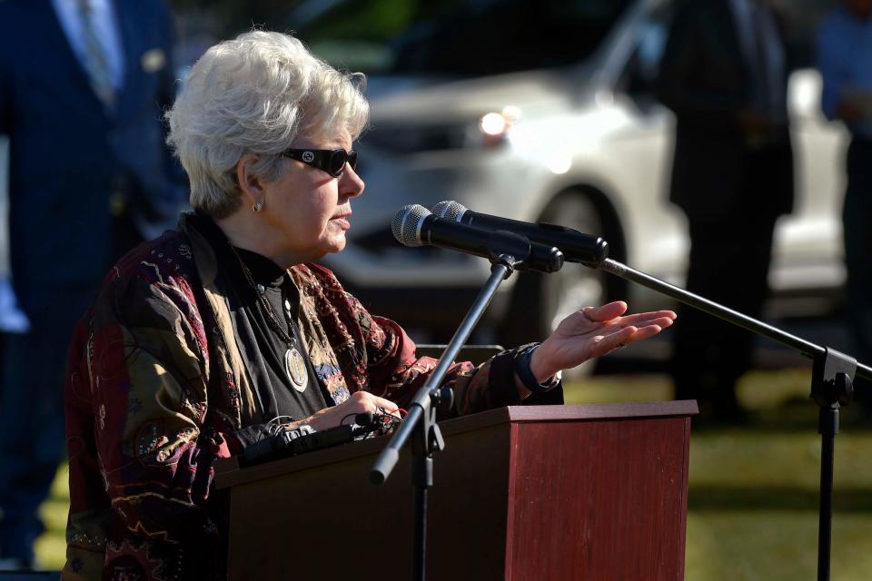 Okaloosa County Commissioner Carolyn Ketchel speaks during the annual Lazarus Field Service on Wednesday.