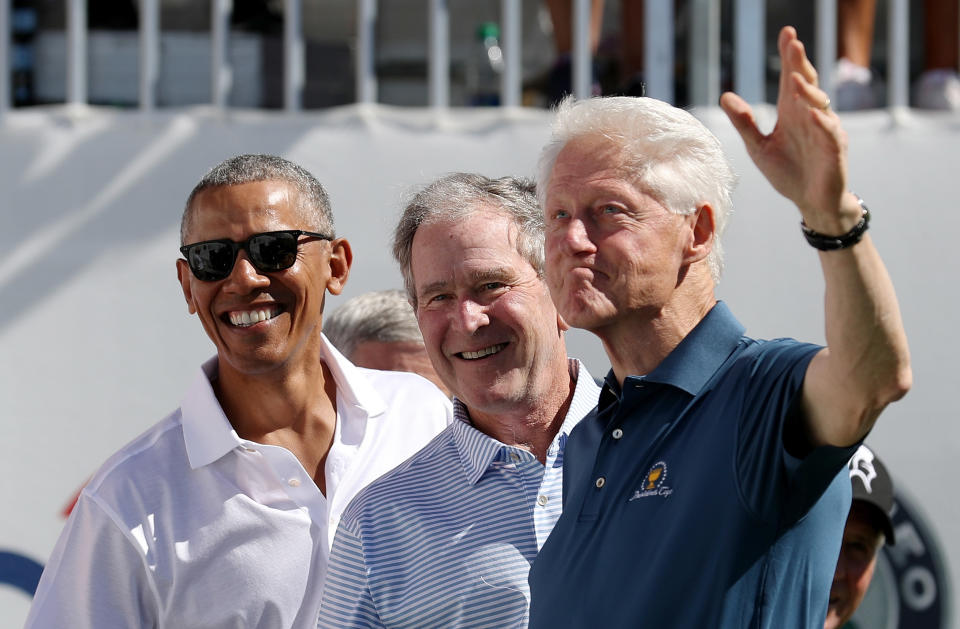 <p>Former U.S. Presidents Barack Obama, George W. Bush and Bill Clinton attend the trophy presentation prior to Thursday foursome matches of the Presidents Cup at Liberty National Golf Club on Sept. 28, 2017 in Jersey City, N.J. (Photo: Rob Carr/Getty Images) </p>