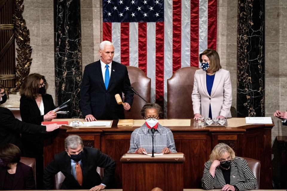 Vice President Mike Pence and House Speaker Nancy Pelosi preside over a Joint session of Congress