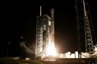 The Boeing CST-100 Starliner spacecraft, atop a ULA Atlas V rocket, lifts off for an uncrewed Orbital Flight Test to the International Space Station