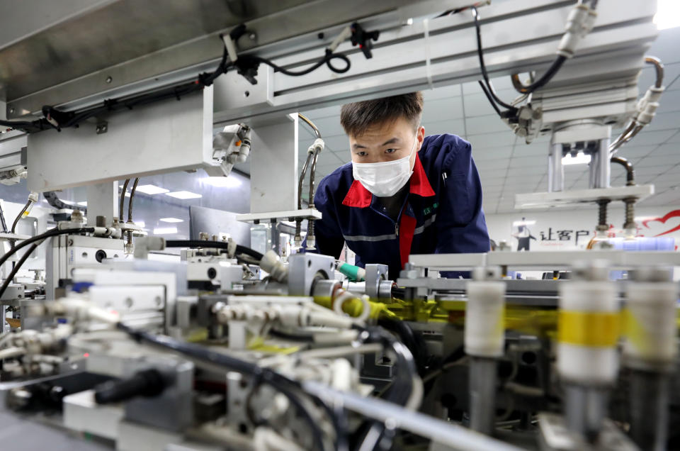 HUAIBEI, CHINA - FEBRUARY 27: An employee works at a lithium-ion battery manufacturing plant on February 27, 2021 in Huaibei, Anhui Province of China. (Photo by Li Xin/VCG via Getty Images)