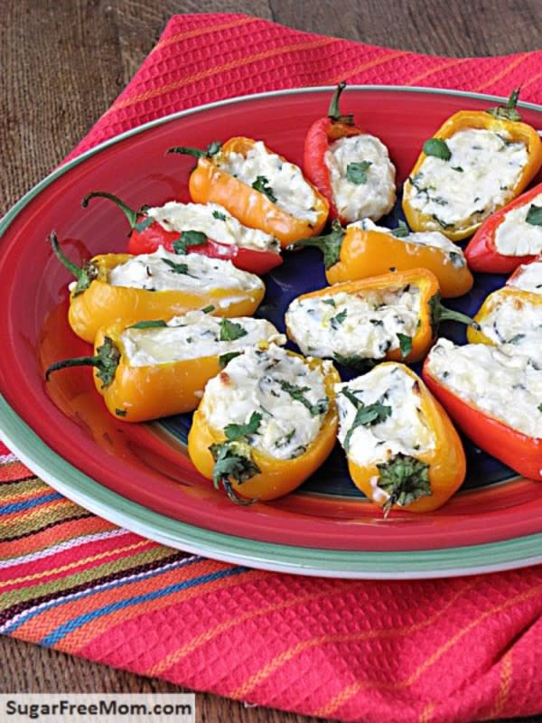 <p>Sugar Free Mom</p><p>Cheesy Sweet Pepper Poppers are a perfect finger food for any summer cookout!</p><p><a href="http://www.sugarfreemom.com/recipes/low-carb-cheesy-sweet-pepper-poppers/" rel="nofollow noopener" target="_blank" data-ylk="slk:Get the recipe!;elm:context_link;itc:0;sec:content-canvas" class="link rapid-noclick-resp">Get the recipe!</a></p>