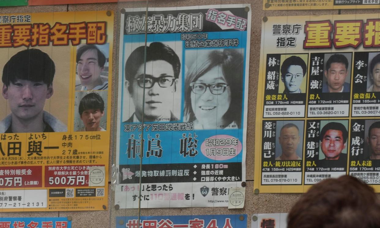 <span>A wanted poster for Satoshi Kirishima (centre top), who spent almost 50 years on the run until admitting on his deathbed that he was a member of the terrorist group East Asia Anti-Japan Armed Front. A DNA test confirmed his claim.</span><span>Photograph: Eugene Hoshiko/AP</span>